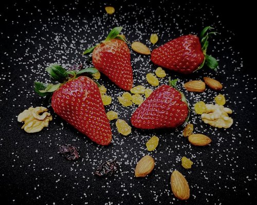 fresh colorful fruits and nuts scattered on a table